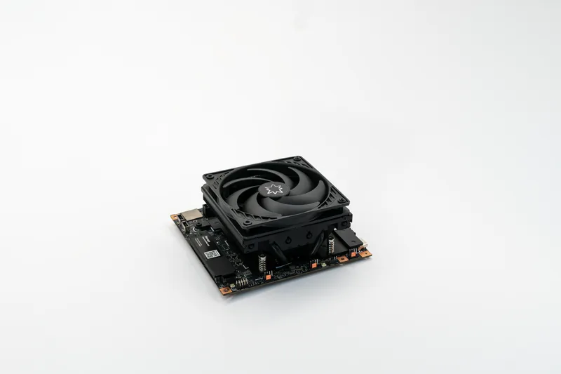 The compute board with its 120 mm cooler mounted